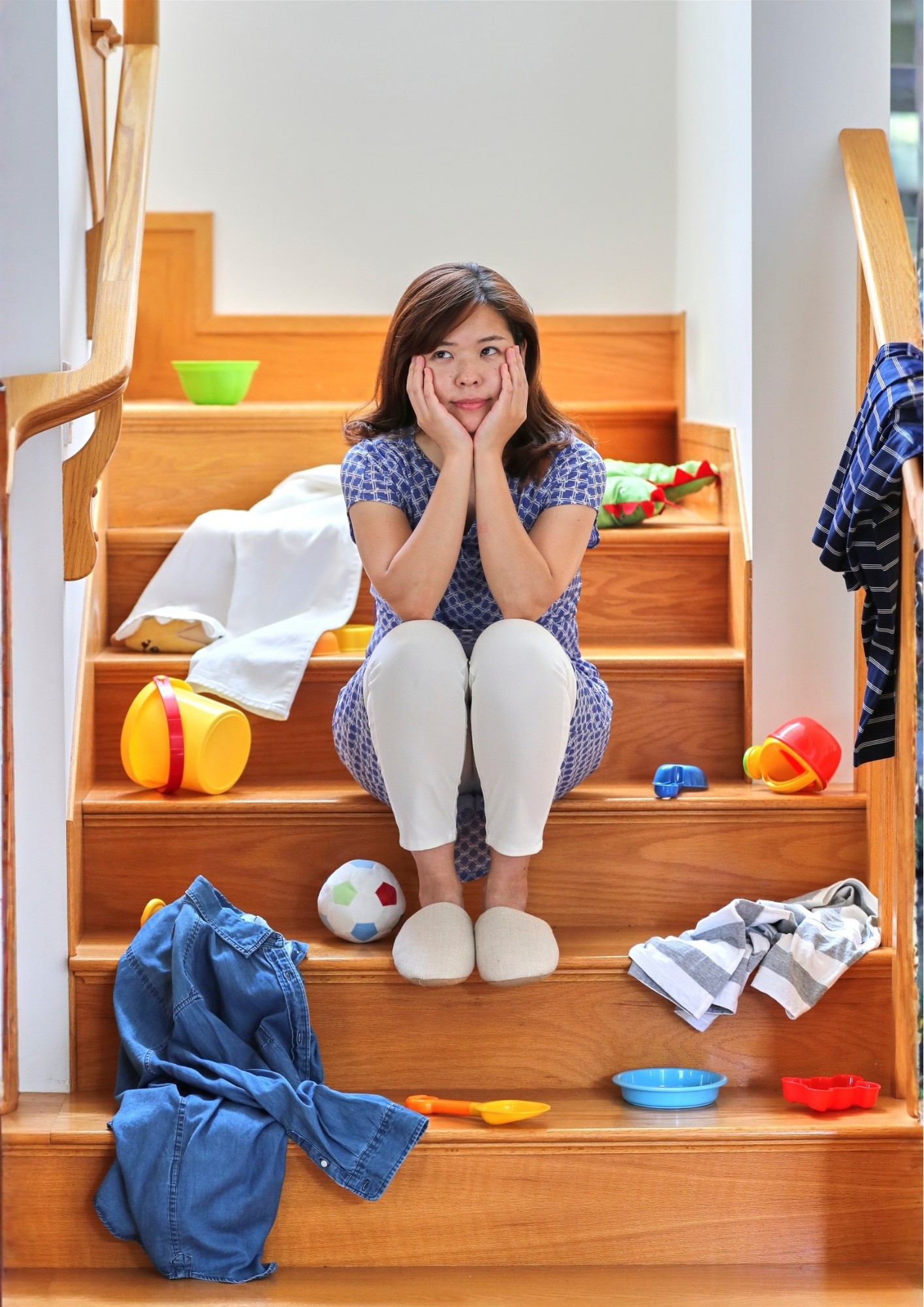 A lady sits on the stairs