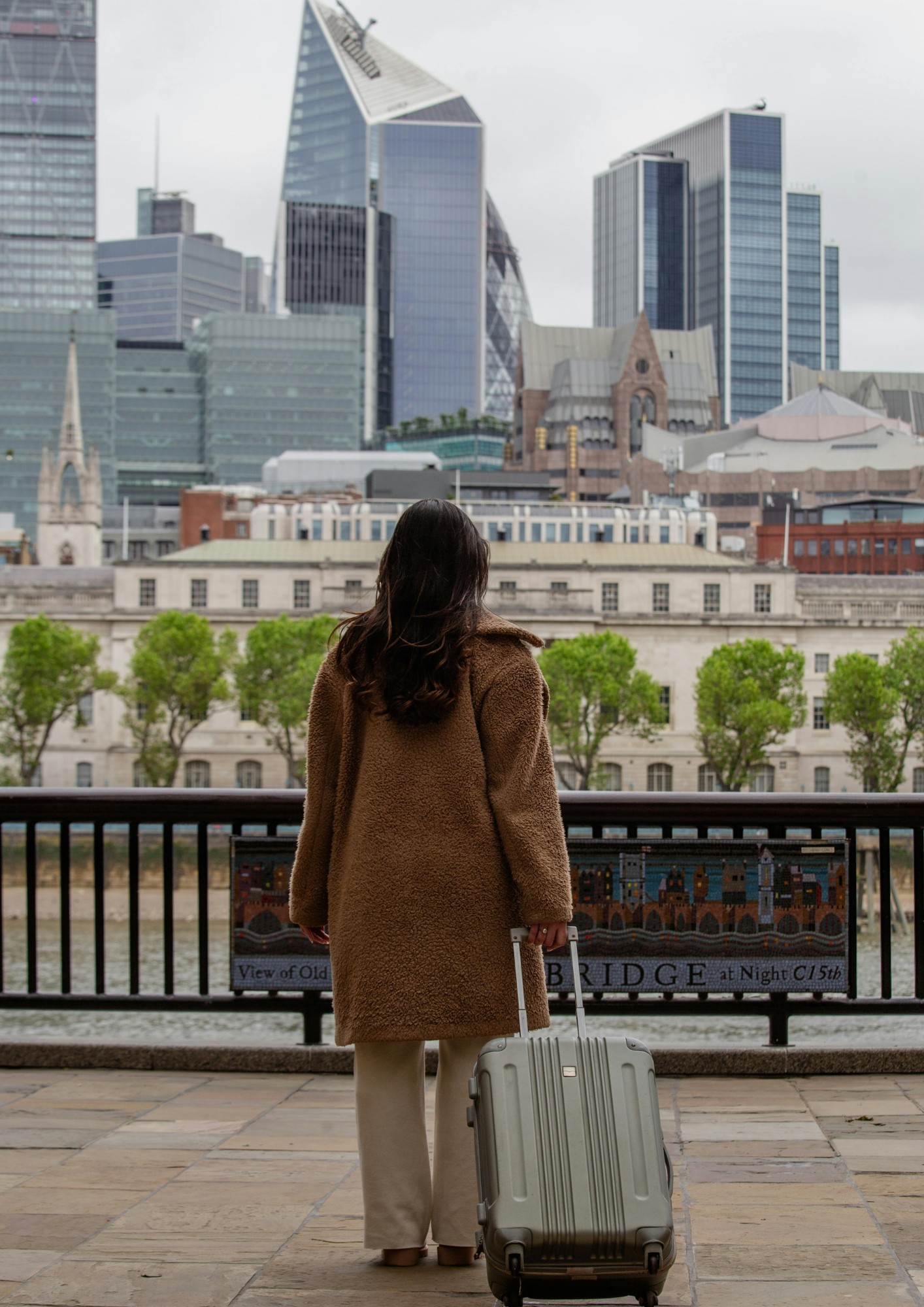 A woman arrives at a train station