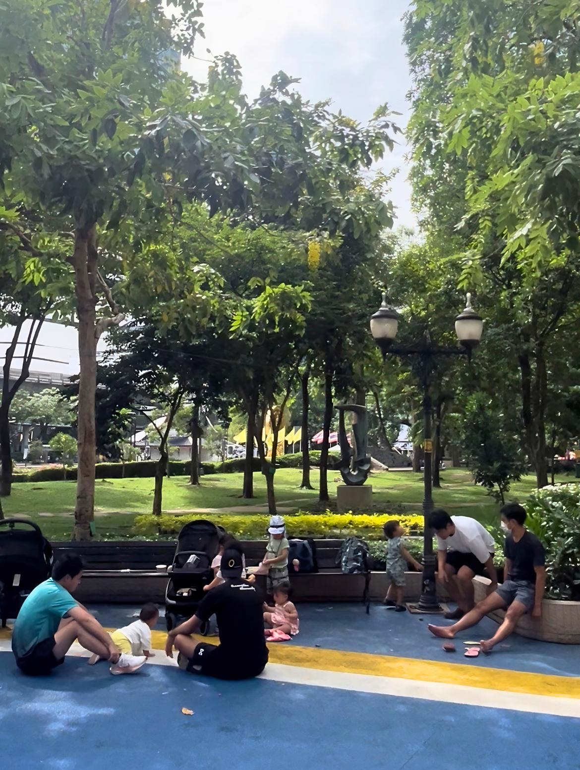 Parents sit with their kids