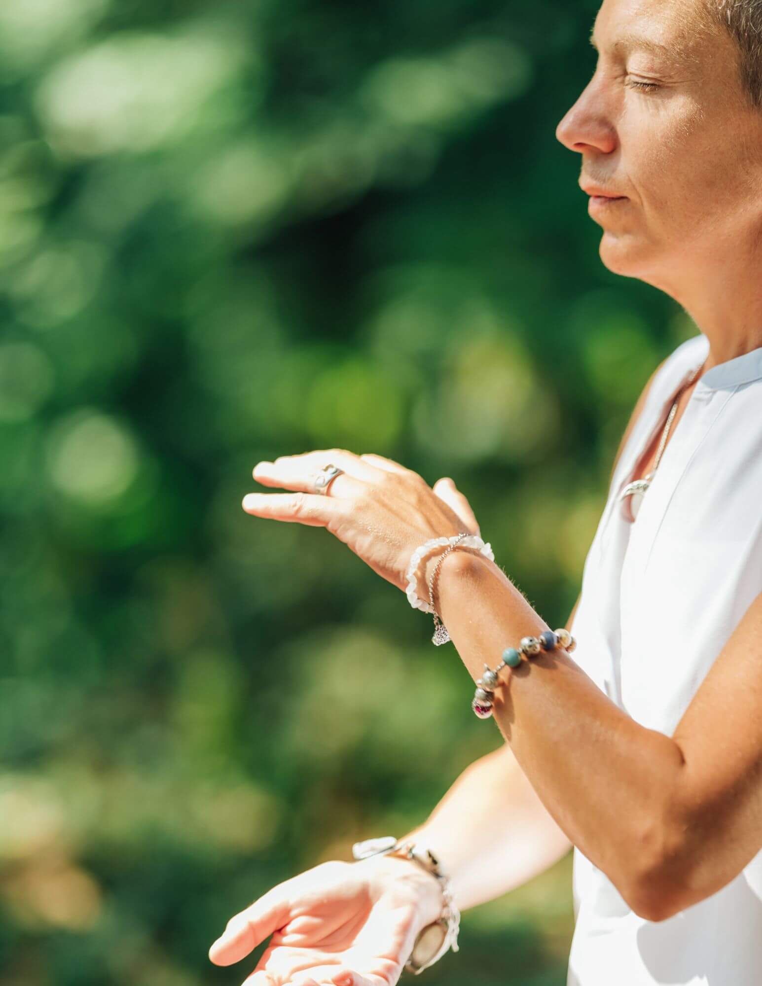 A white woman practicing Qigong
