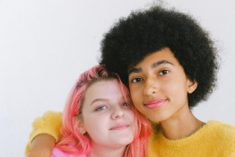 A boy and girl hug