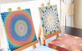 Small dot paintings done on canvas