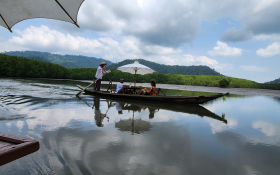 People on a small boat in Koh Chang