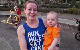 A mother holds her baby daughter.