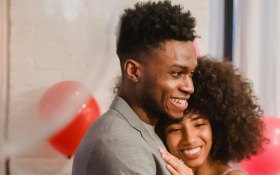 A couple hug each other